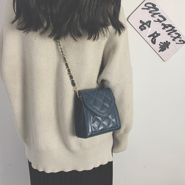 Női alkalmi táska eko bőrből, hosszú füllel