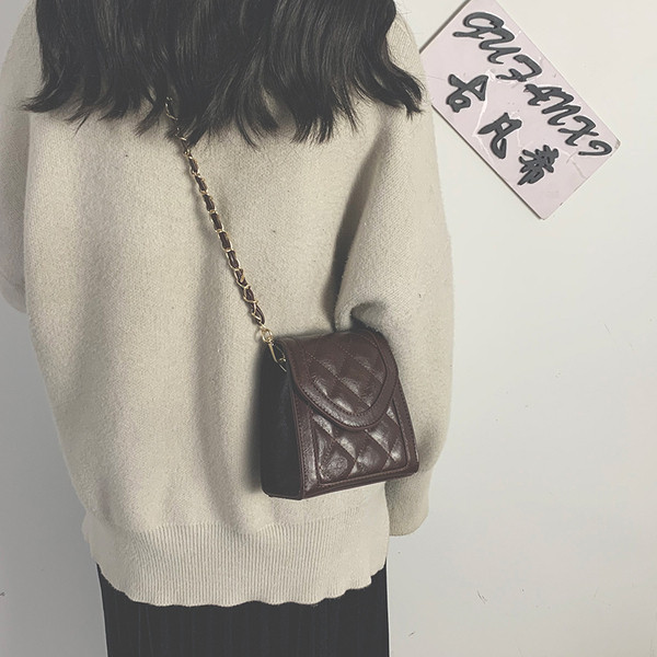 Női alkalmi táska eko bőrből, hosszú füllel