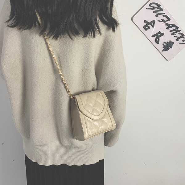 Női alkalmi táska eko bőrből, hosszú füllel