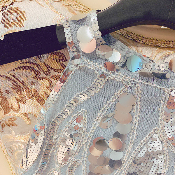 Stílusos női felső, flitterekkel, négy színben