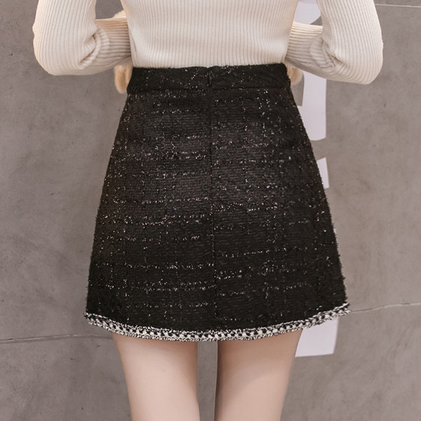 Modern női szoknya magas derékkal és gyöngyökkel