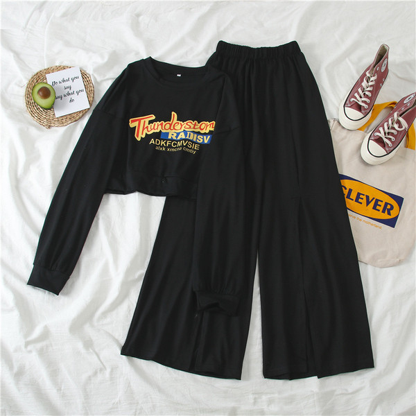 Kétrészes női sportkészlet fekete és szürke színben