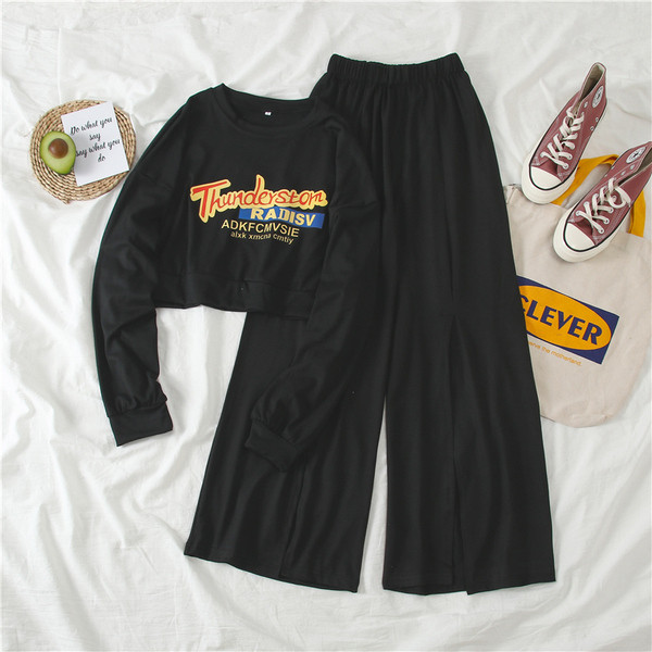 Kétrészes női sportkészlet fekete és szürke színben