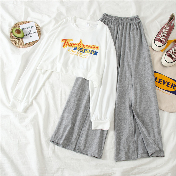 Kétrészes női sportkészlet fekete és szürke színben