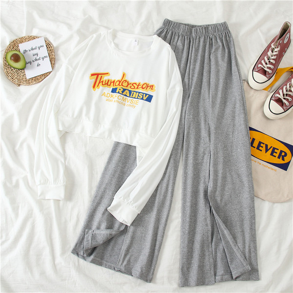 Kétrészes női sportkészlet fekete és szürke színben