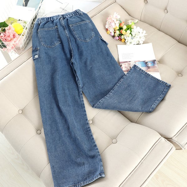 Modern női széles farmer, kék színű zsebbel és gombokkal