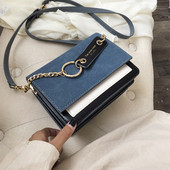 Modern női táska fém elemekkel, hosszú füllel, többféle színben