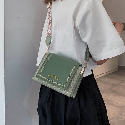 Modern női táska hosszú füllel, négy színben