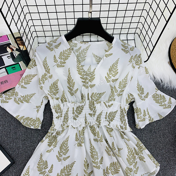 Modern női blúz aszimmetrikus modell virágmintával