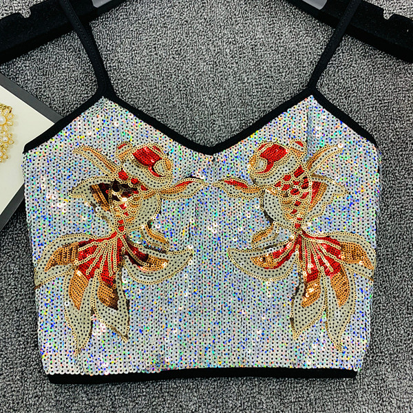 Modern női felső vékony pántokkal és flitterekkel