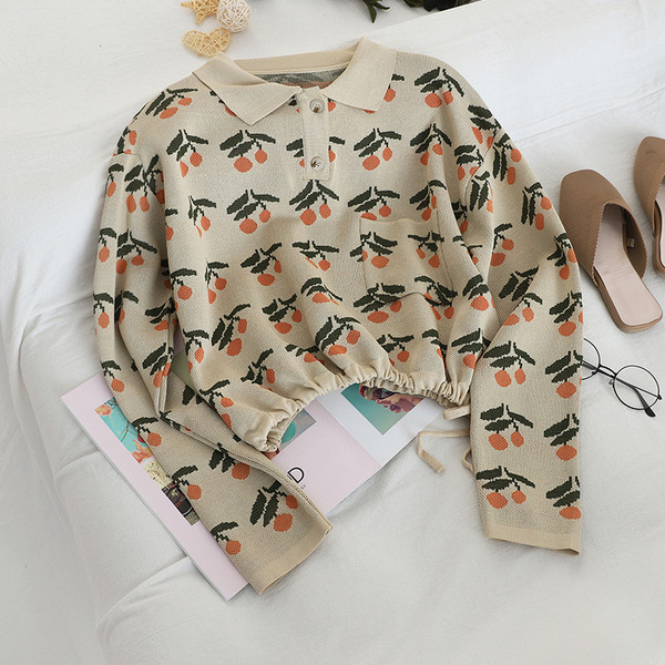 Vékony kötésből készült, hétköznapi női pulóver gallérral, kék és bézs színben