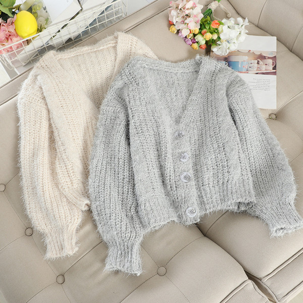 Stílusos női mellény gombokkal és hosszú ujjú több színben