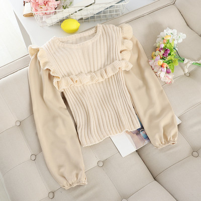 Alkalmi női pulóver fürtökkel és ovális nyakkivágással