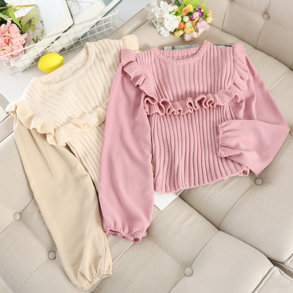 Alkalmi női pulóver fürtökkel és ovális nyakkivágással