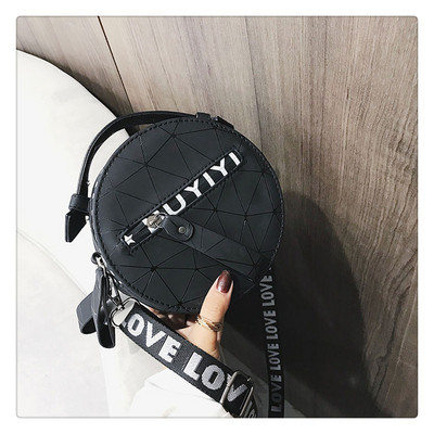 Modern női táska kerek formában, rövid és hosszú füllel