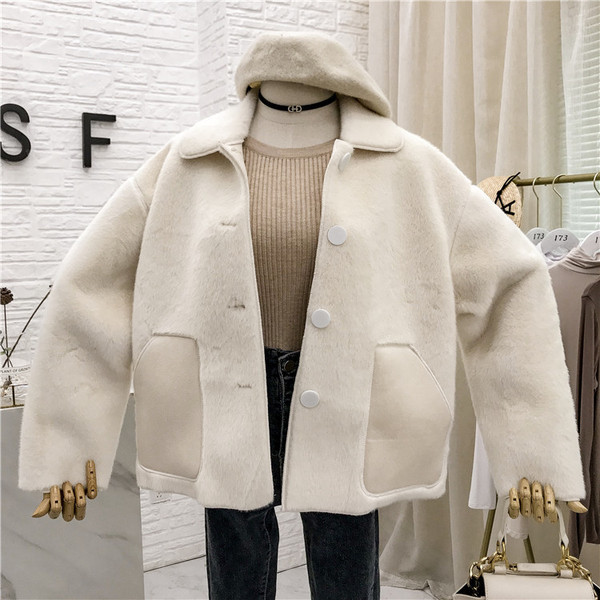 Női pehelykabát övvel és zsebekkel több színben