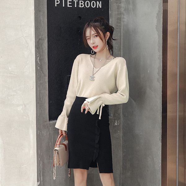 Új modell női pulóver V-nyakú és lótusz ujjú több színben