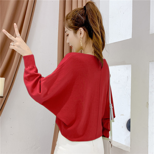 Modern női pulóver széles ujjal és O-nyakkal