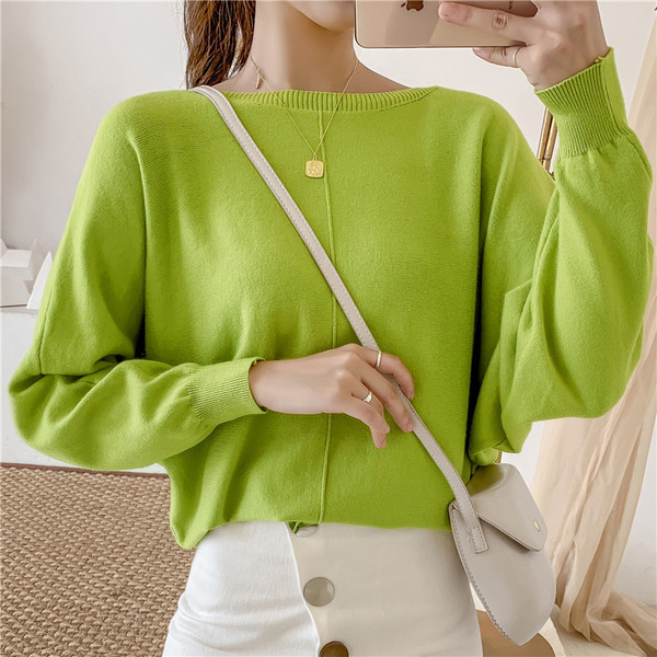 Modern női pulóver széles ujjal és O-nyakkal