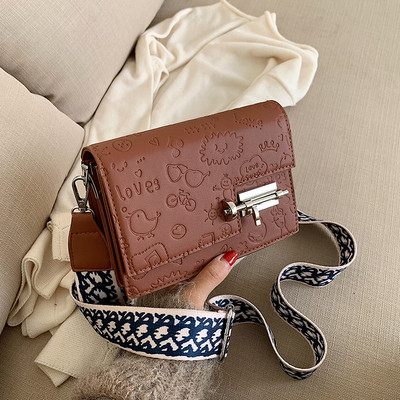 Modern női táska fém elemmel több színben