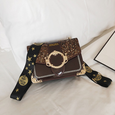 Stílusos női táska fényes részecskékkel és fém elemekkel négy színben