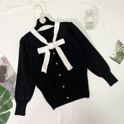 Vesta eleganta de dama cu panglica si nasturi in negru, alb si maro