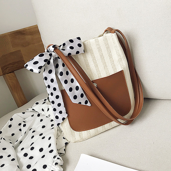 Női táska szalaggal és vállfogantyúval több színben