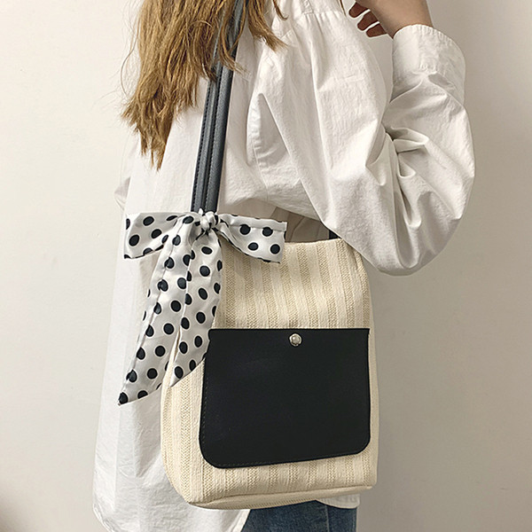 Női táska szalaggal és vállfogantyúval több színben