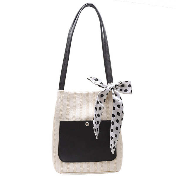 Női táska szalaggal és vállfogantyúval több színben