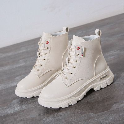 Öko bőrből készült női csizma fekete-fehér színben