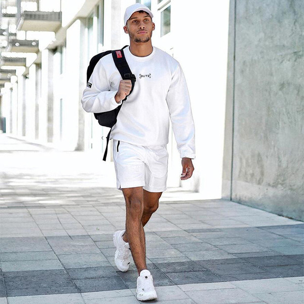 Lezser férfi blúz négy színben felirattal, ovális nyakkivágással