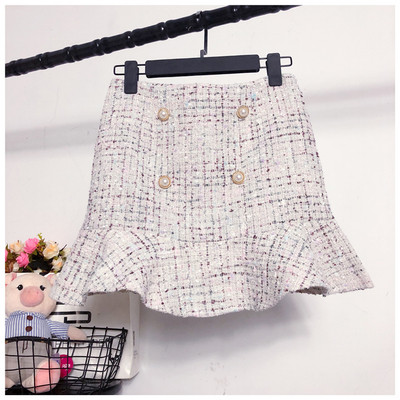 Aktuális női szoknya szabású modell magas derékkal, gombokkal több színben