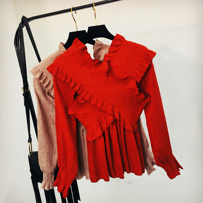 Női téli blúz fehér és fekete színben