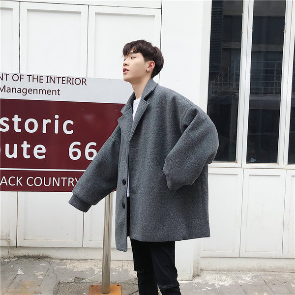 Alkalmi férfi kabát szürke és fekete zsebekkel