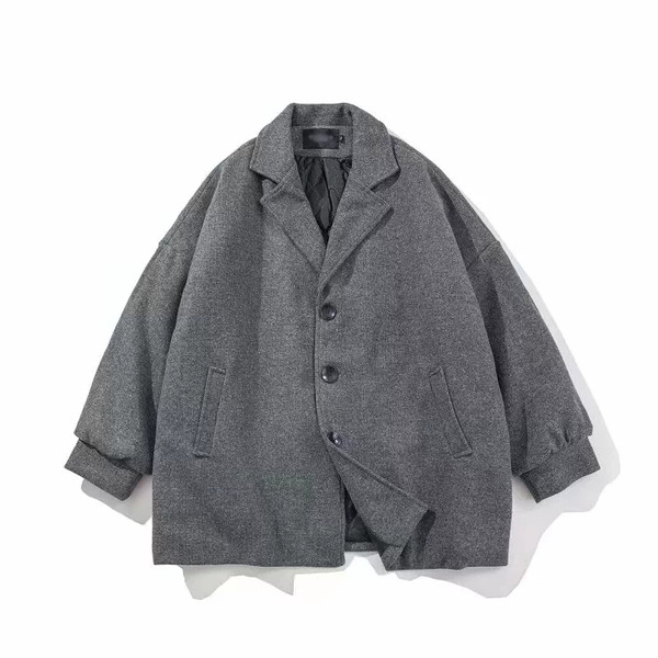 Alkalmi férfi kabát szürke és fekete zsebekkel