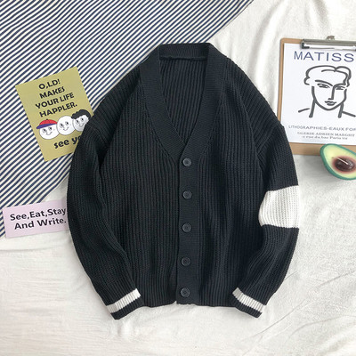 Férfi mellény fekete, barna és szürke gombokkal