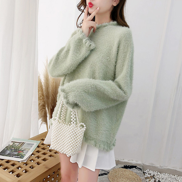 Stílusos női pulóver ovális nyakkivágással és hosszú ujjal