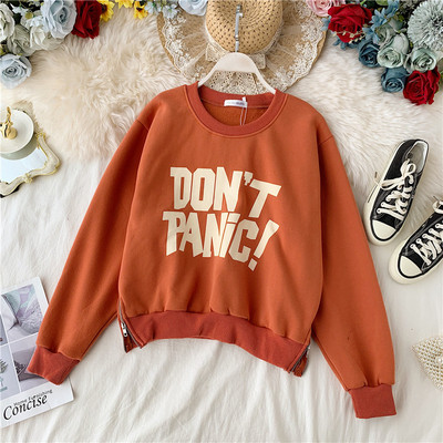 Alkalmi női blúz cipzárral és felirattal, különböző színekben