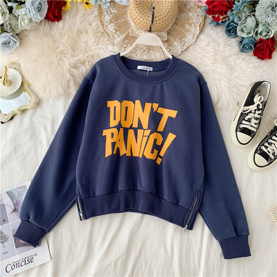 Alkalmi női blúz cipzárral és felirattal, különböző színekben