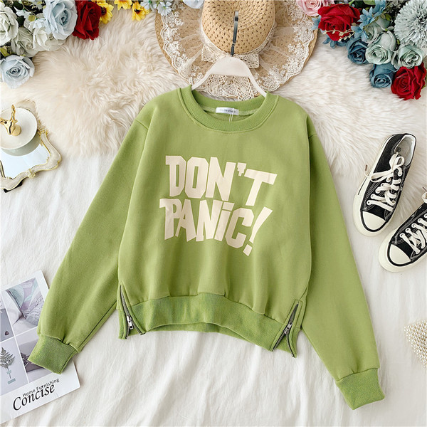 Alkalmi női blúz cipzárral és felirattal, különböző színekben