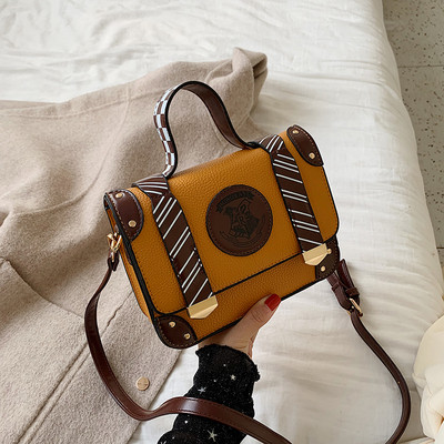 Μοντέρνα γυναικεία τσάντα με μικρή και μακρά λαβή σε μαύρο, καφέ χρώμα και χρώμα μουστάρδας