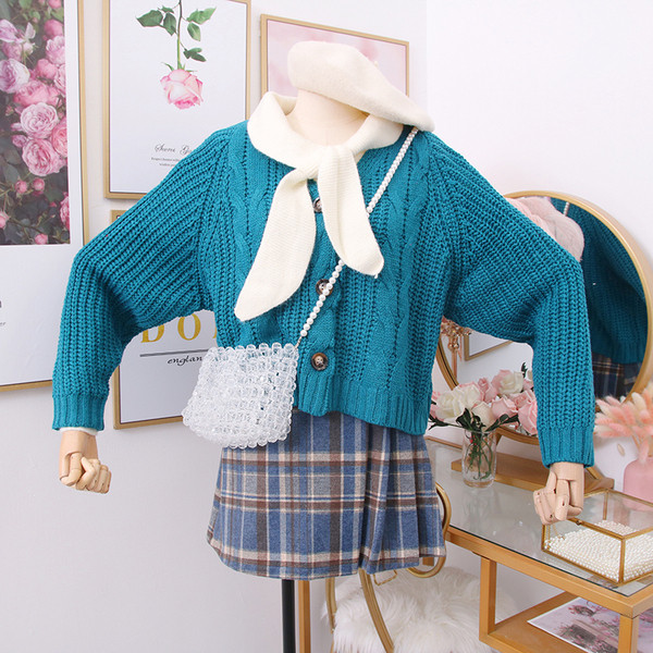 Μοντέρνα γυναικεία ζακέτα  με κουμπιά σε μπλε, μπεζ, κίτρινο και κόκκινο χρώμα