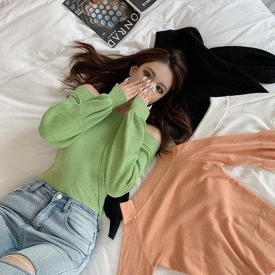 Bluză de damă cu umerii căzuți și mâneci largi în negru, alb, verde și portocaliu