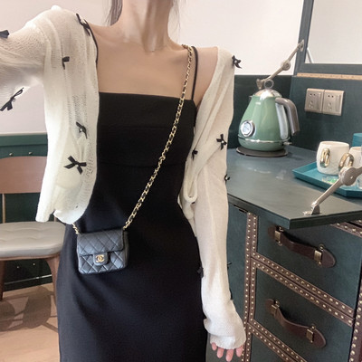 Σύντομη γυναικεία ζακέτα με κορδέλες