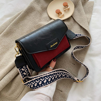 Női táska hosszú füllel fekete, kék, zöld és barna színekben