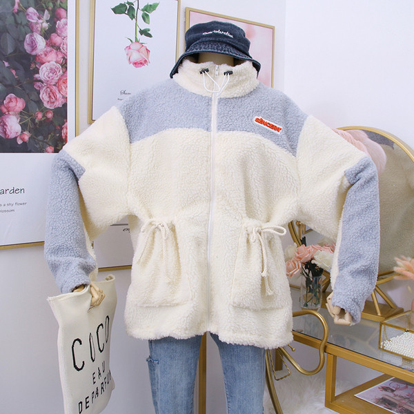 Női alkalmi pulóver kék és bézs cipzárral és zsebekkel