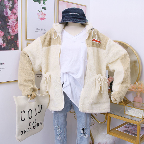 Női alkalmi pulóver kék és bézs cipzárral és zsebekkel