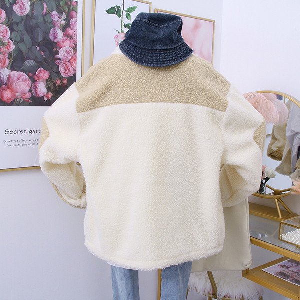 Női alkalmi pulóver kék és bézs cipzárral és zsebekkel