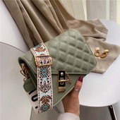 Modern női táska hosszú mintás fogantyúval, fém elemekkel