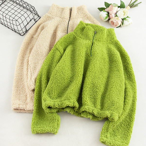 Napi női pulóver négy színben, cipzárral